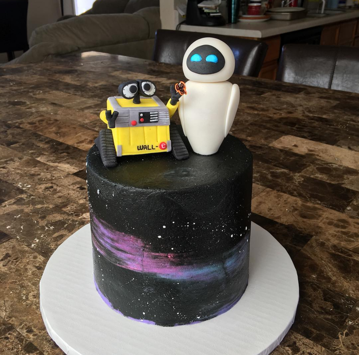 Black Galaxy Wall-E themed anniversary Cake from Instagram